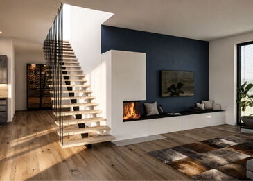 Ein moderner, deckenhoher Eckkamin mit integrierter schwarzer Sitzbank und Stauraumschubladen neben einer Holztreppe.