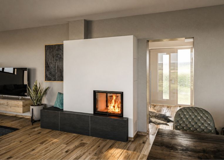 Perspektive auf den Kamin mit Durchsicht-Effekt. Der Feuertischblock aus großformatigen Platten unterstreicht die zeitlose Eleganz der Anlage.