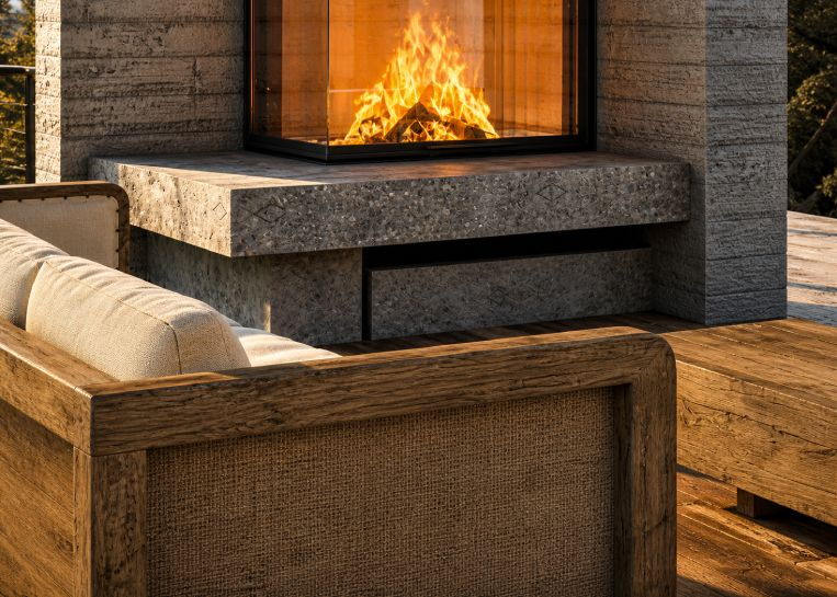 Detailansicht des massiven Feuertisches in Naturstein-Optik, der die funktionale und ästhetische Basis des Stylefire II Kamins bildet.