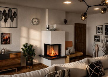 Eine moderne Kombiofen-Anlage mit Ecksichtfenster, freischwebendem Keramik-Feuertisch und angrenzender Sitzbank im Wohnbereich.